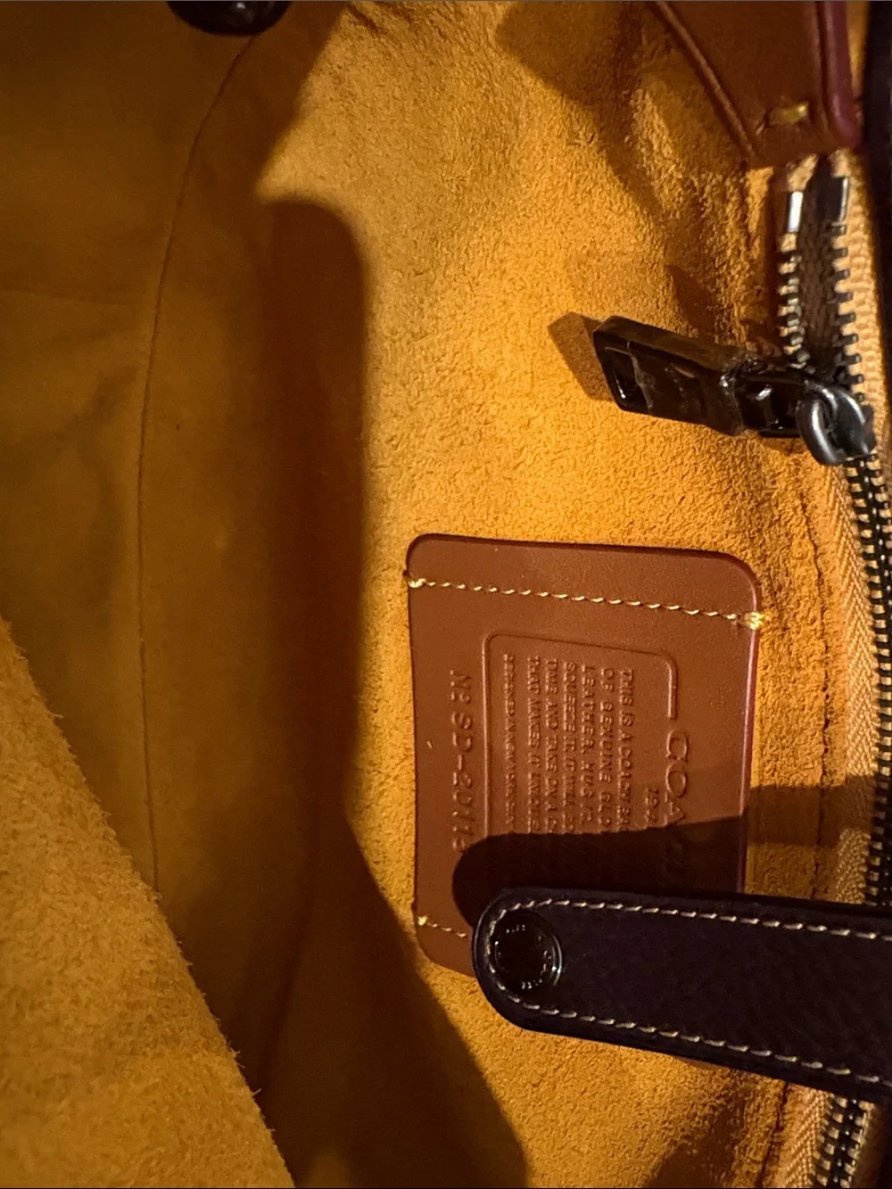Coach 1941 pebbled  leather saddlebag with whiplash detail